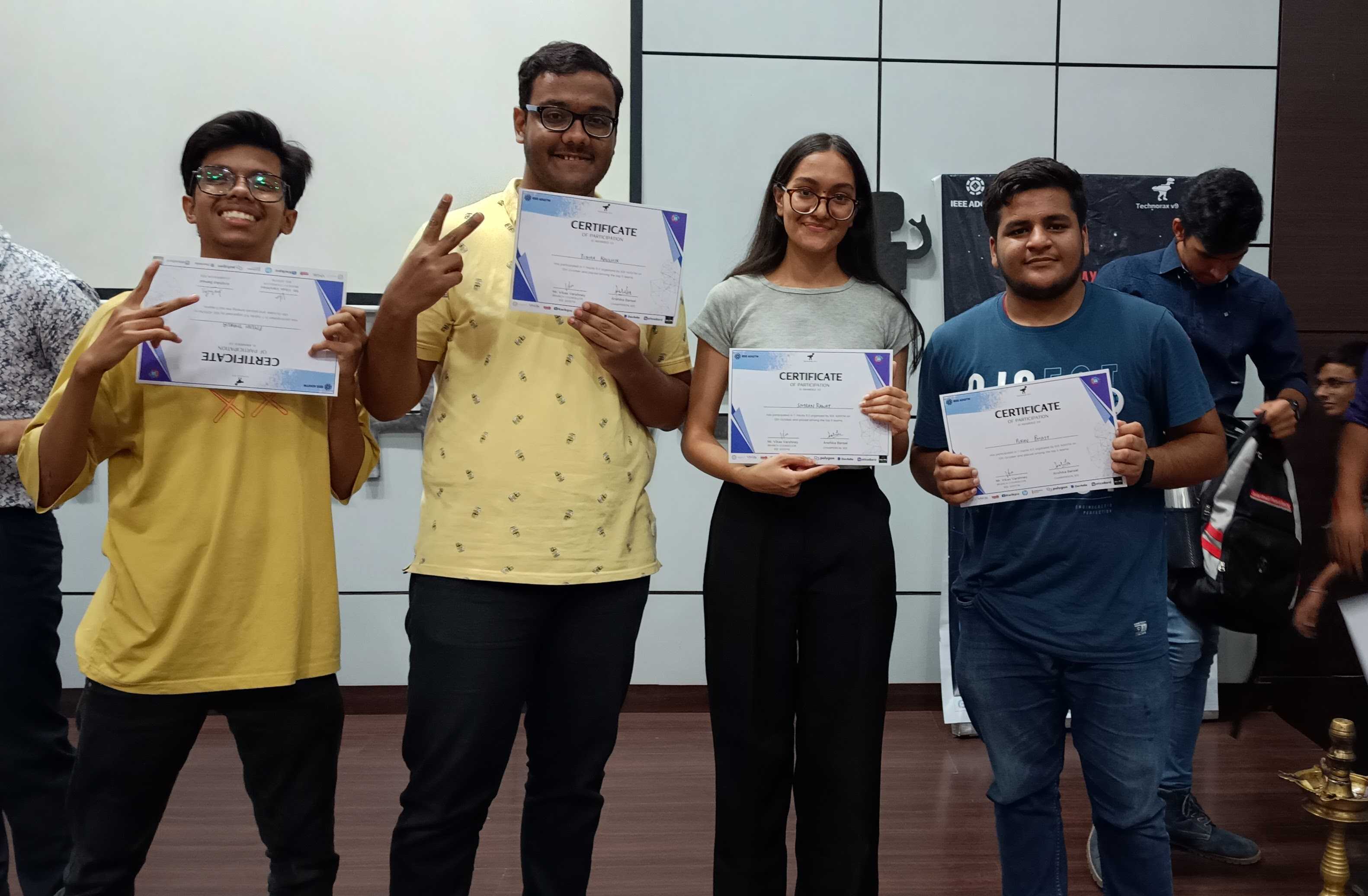 Team holding certificates after first hackathon win